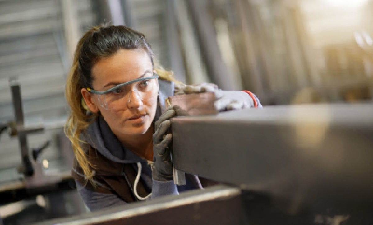 Worker with safety goggles 